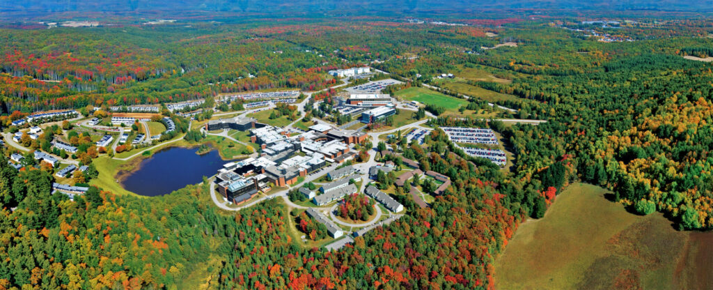 A bird-eye view of the Nipissing campus and the forest surrounding it